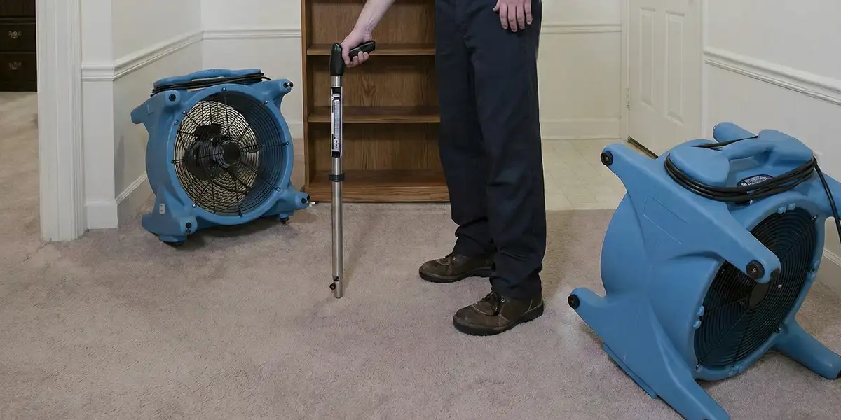 emergency water removal equipment deployed to dry a flooded residential interior in Houston, TX